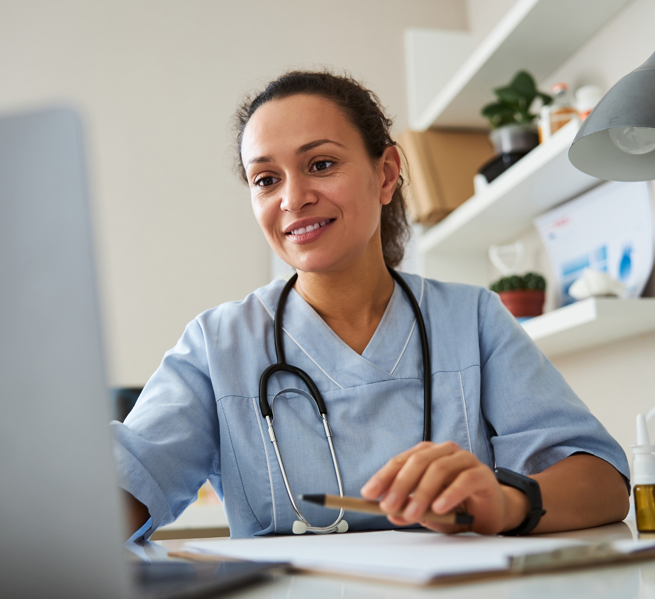 provider working at her desk