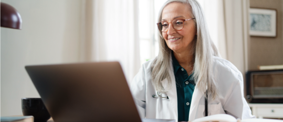 Amwell Medical Group doctor seeing a patient online