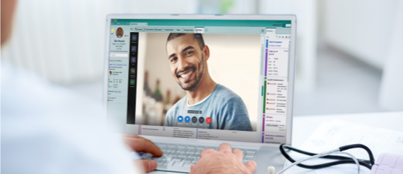 patient and provider talking via laptop