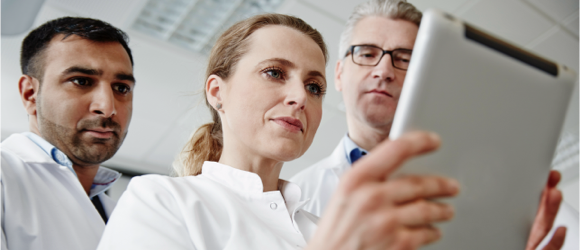 providers looking at a tablet