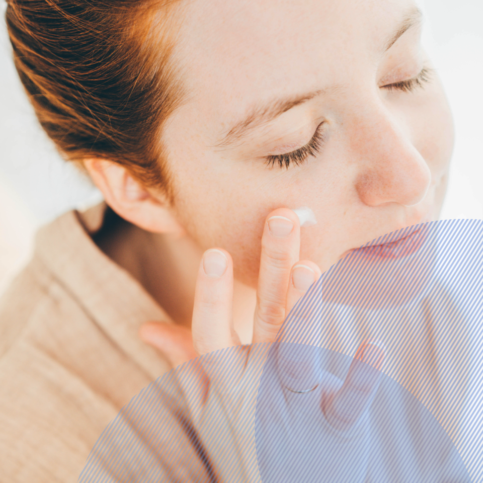 A woman taking care of her skin