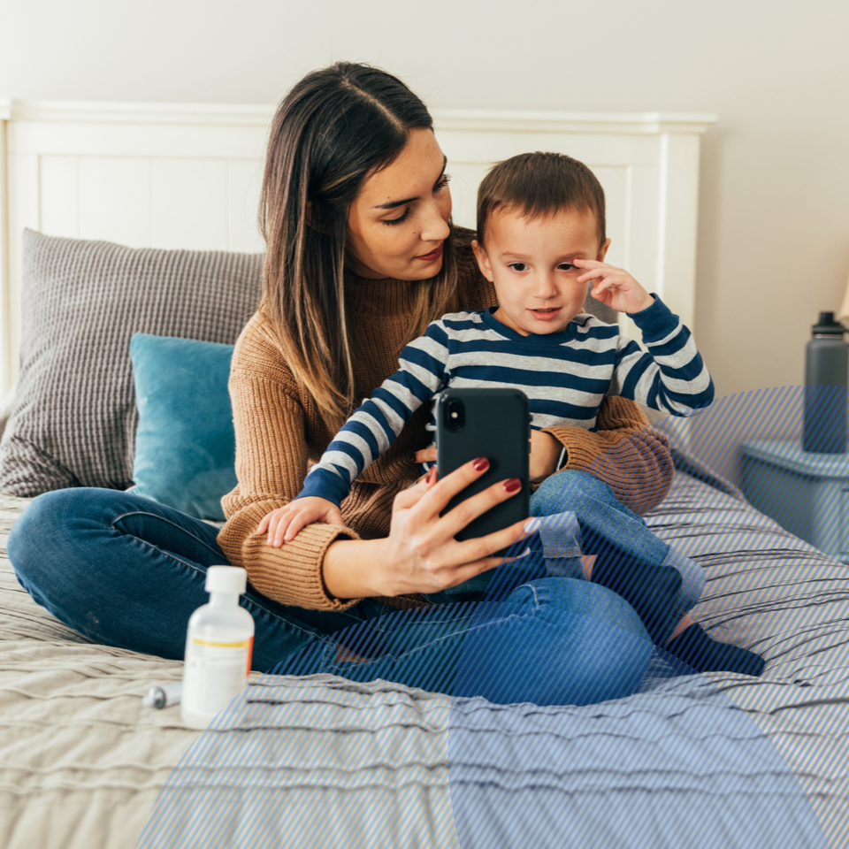 mother and a child talking to a pediatrician via phone