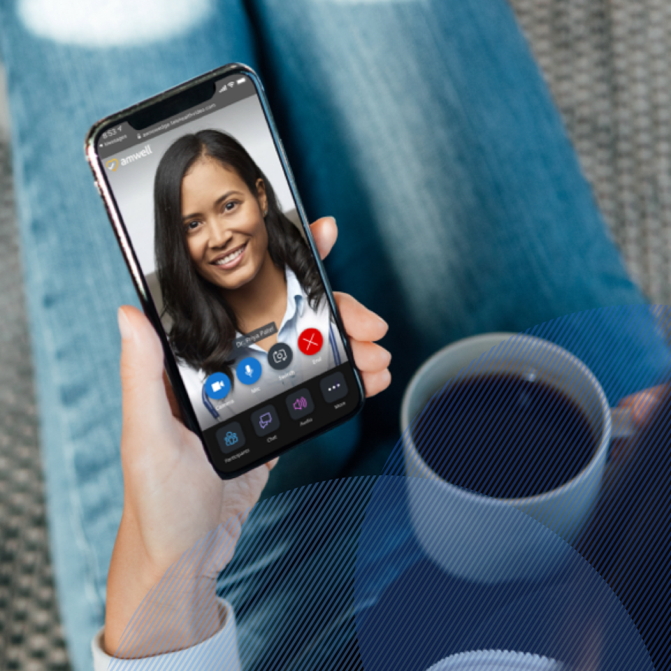 Patient on her phone having an online scheduled visit